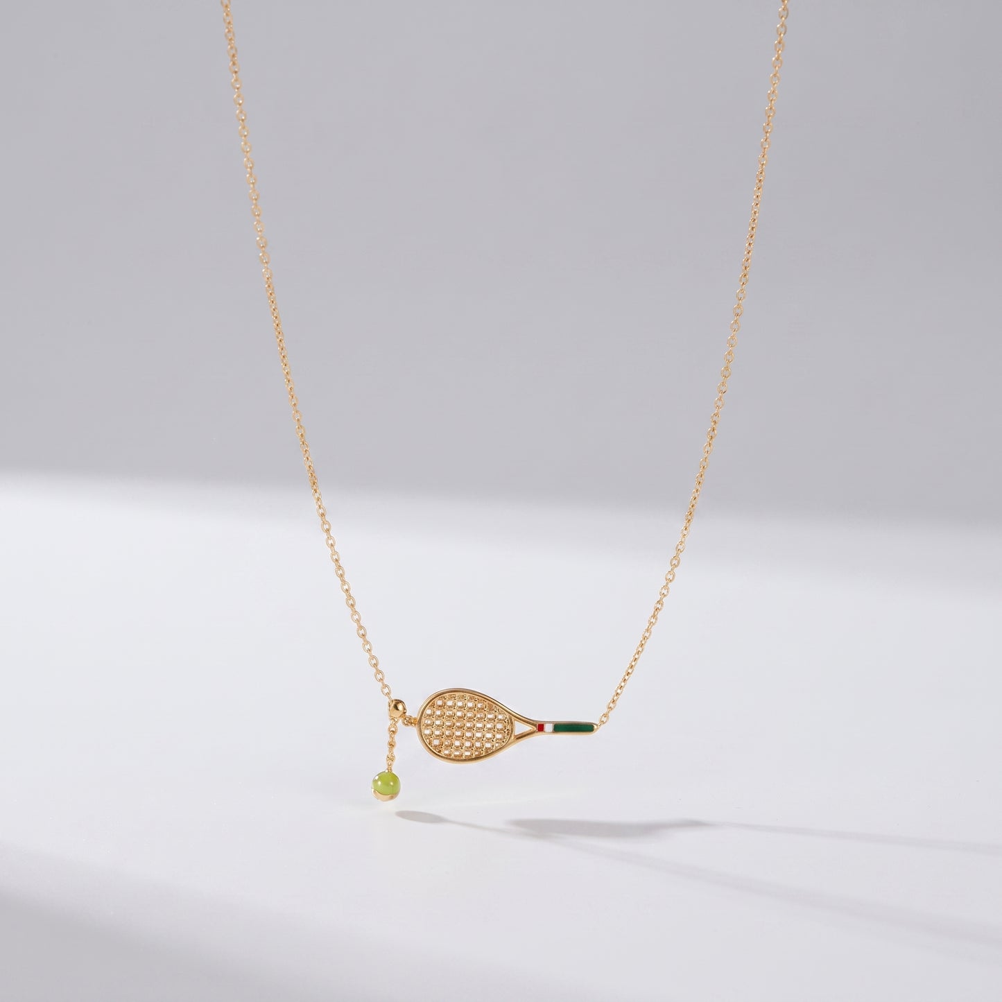 Helena Gold Tennis Ball & Racket Necklace - Joie d’Or