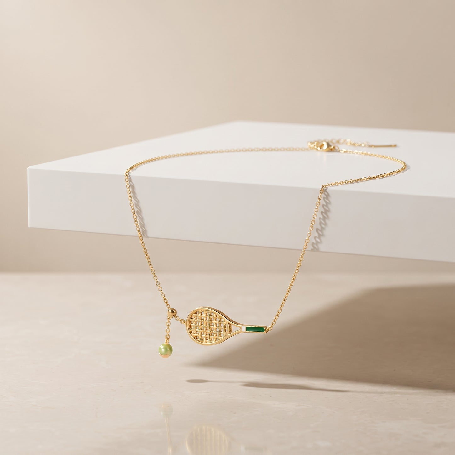 Helena Gold Tennis Ball & Racket Necklace - Joie d’Or
