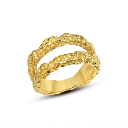 Aurélie hammered double gold ring on white: two textured bands joined into one ring with a beaten foil finish