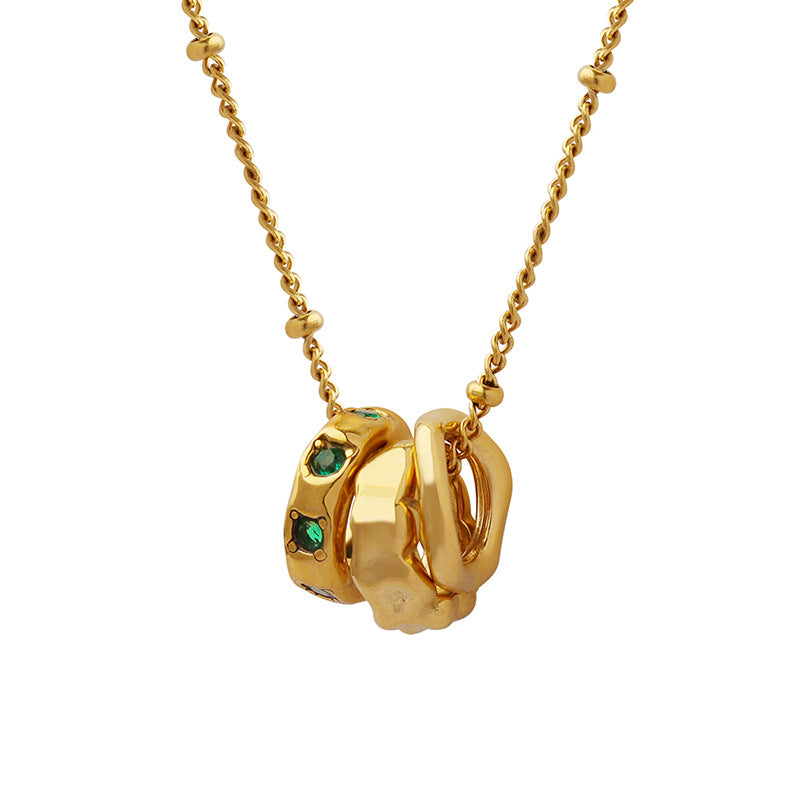 Benedetta triple ring gold necklace: hammered, smooth and green crystal rings on a beaded chain