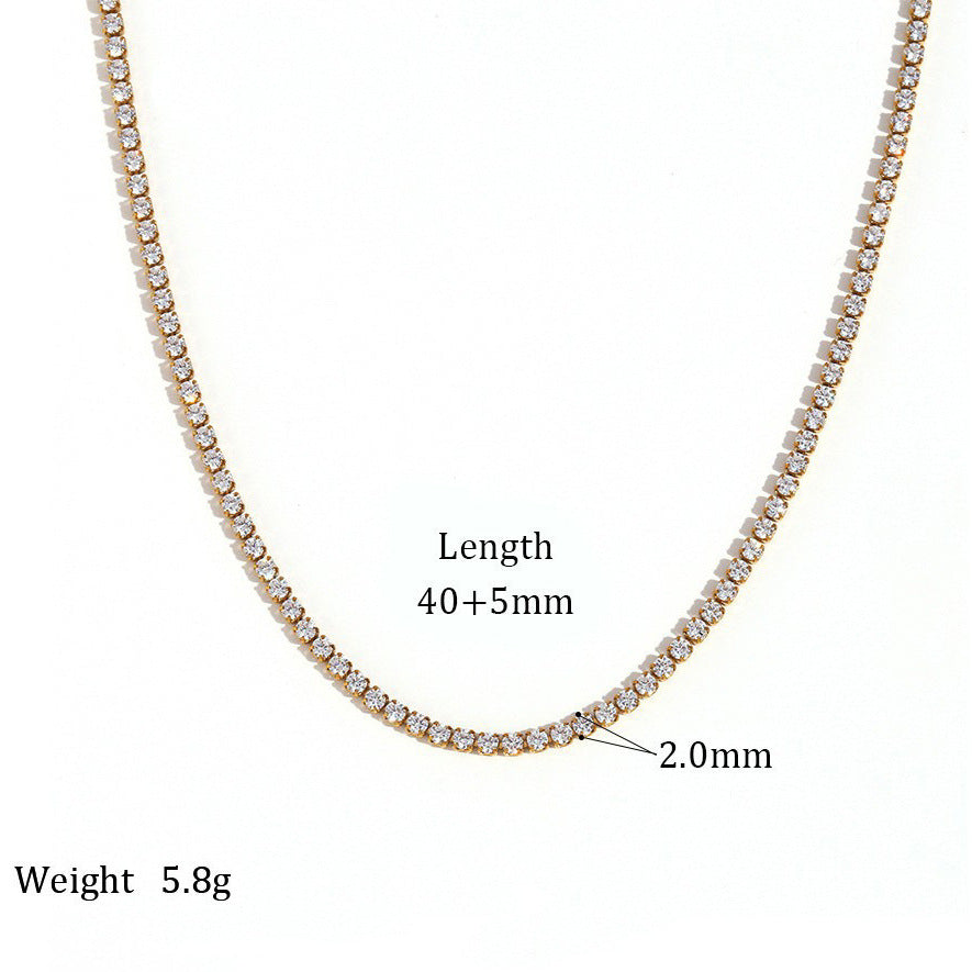 Emma tennis chain gold necklace on white with the 2 mm stone size and 40 plus 5 cm length marked