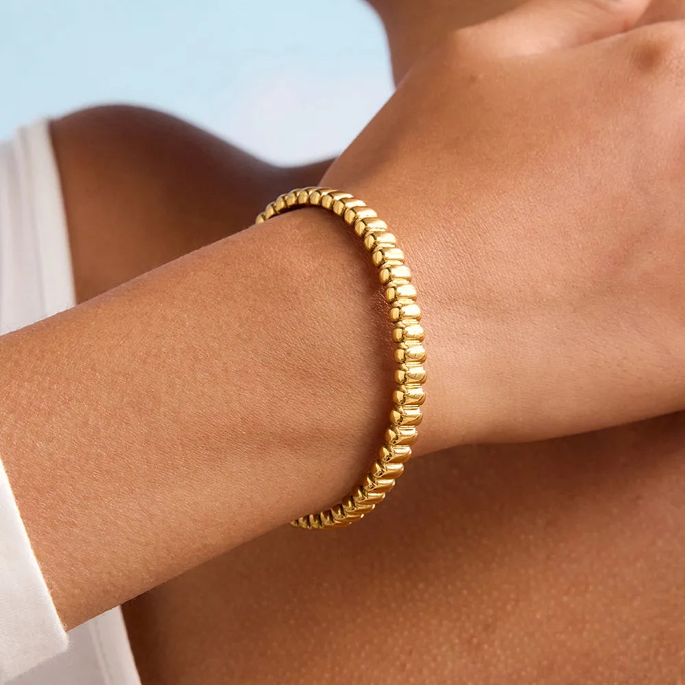 Emma Sculpted Gold Bangle