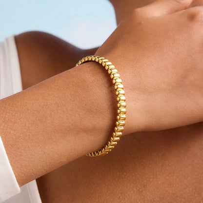 Emma Sculpted Gold Bangle