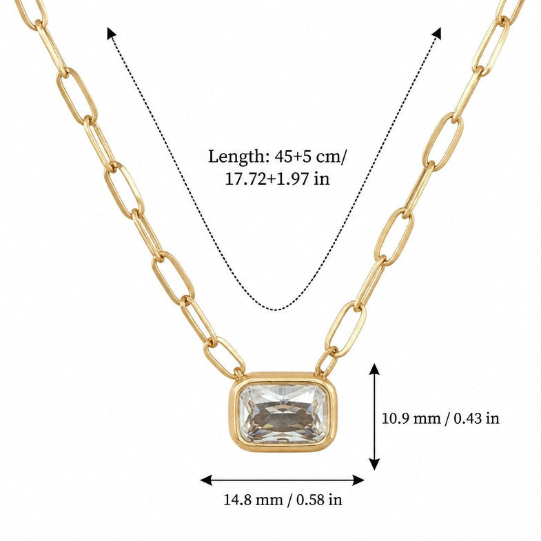 Isabelle emerald cut gold necklace: a clear emerald-cut zircon in a gold bezel on a paperclip chain, 14.8 by 10.9 mm, length 45 cm plus 5 cm, weight 8.8 g