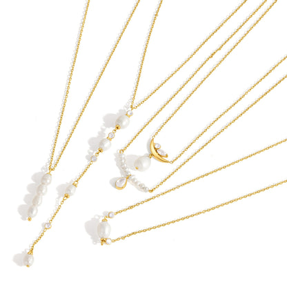Lisette pearl bar with a teardrop crystal among gold pearl necklaces on a white background