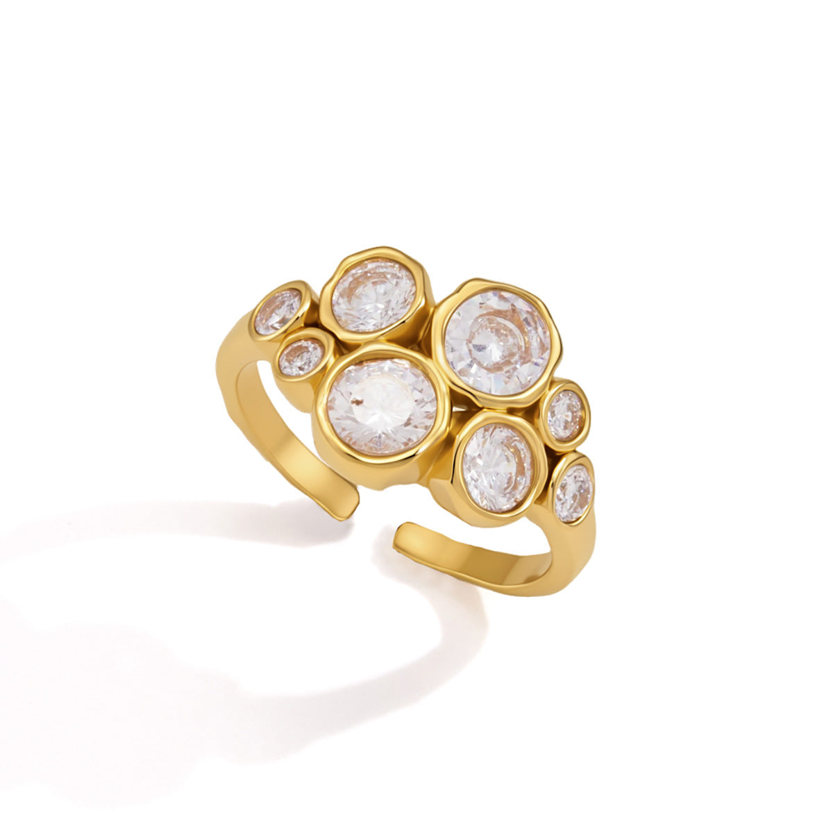 Louise bubble cluster gold ring with mixed round crystals in organic bezels on an open band, white background
