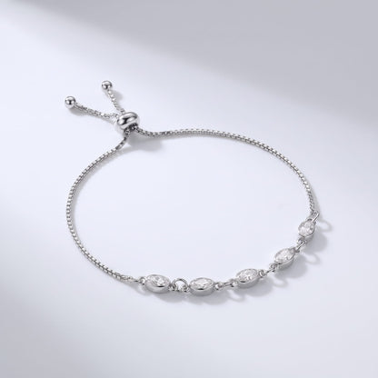 Marisa oval crystal silver bracelet on a light gray surface with slider clasp and box chain