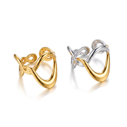 Ophélie twisted wave ring in gold beside the two-tone version on a white background
